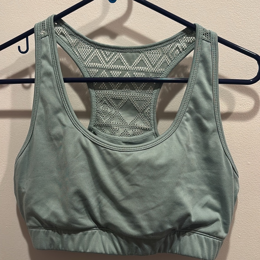 ZYIA ACTIVE Bomber Green Racerback Sports Bra with Geometric Detailing